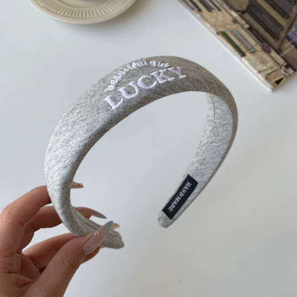 Gray Luck embroidery