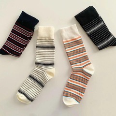 Korean-style Instagram-inspired colorful striped mid-calf socks, black-and-white minimalist design—perfect for student couples looking for sporty, casual, and eye-catching contrast-style ankle socks.