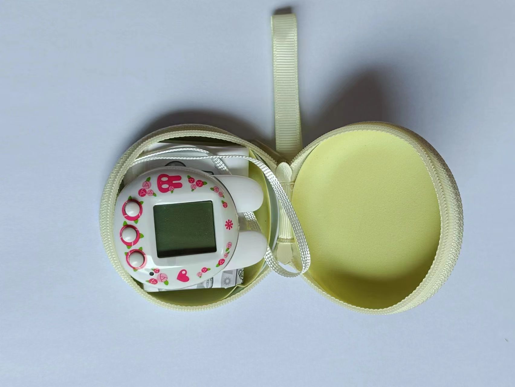 Juguetes electrónicos de los niños transfronterizos mascota máquina Elf desarrollar máquina de juego portátil escuela niños y niñas juguetes educativos