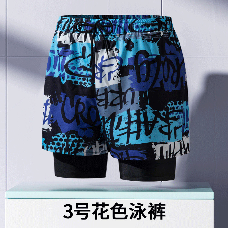 Pantalones de baño de hombre para adultos nuevos anti-vergüenza de doble capa de ángulo plano profesional de secado rápido de moda relajada alta elástica gran tamaño de arena