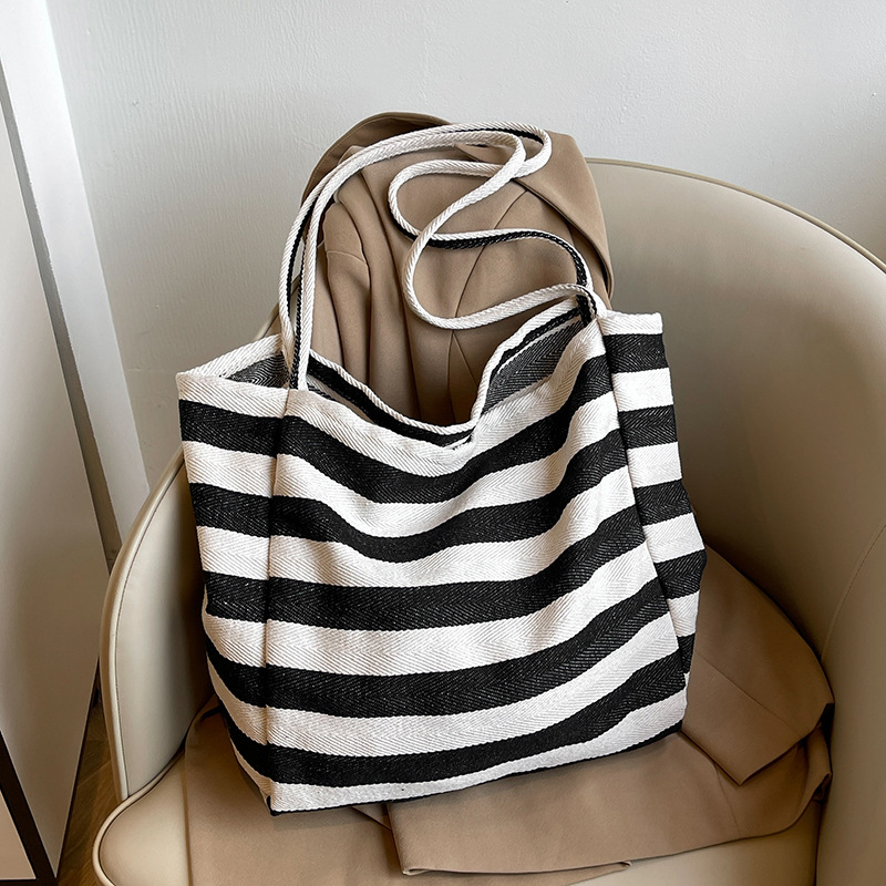Corea del Sur ins bolsas de lona a rayas de color contraste bolsas de hombro de gran capacidad bolsas de compras de viento perezoso bolsas grandes