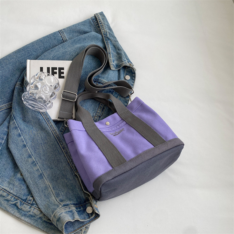 Bolso de hombro para mujer de nicho nuevo para otoño 2023, estilo coreano de internet, bolso de lona casual de mano, bandolera versátil para estudiantes