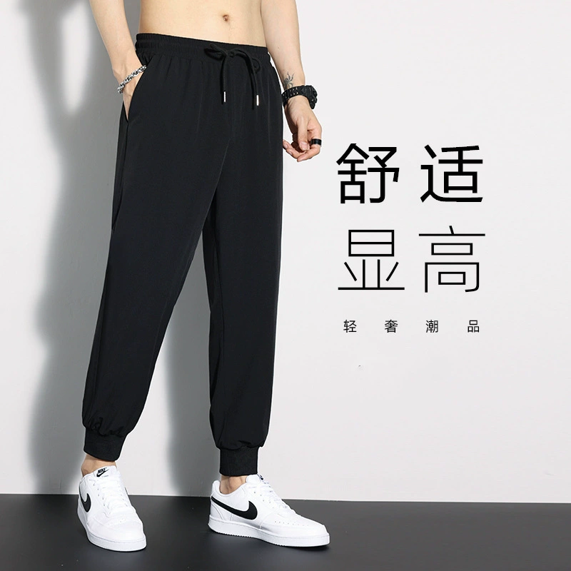 Летние сплошные брюки мужские резьбовые брюки брюки брюки широкие ноги повседневные брюки пучки ноги свободные мужские брюки прилив спортивные штаны