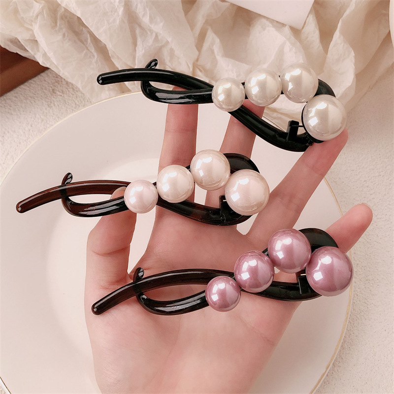 Clip de perla simple detrás de la cabeza de alto nivel de torsión de torsión de clip de cabello grande más temperamento retro tarjeta de cabello de disco