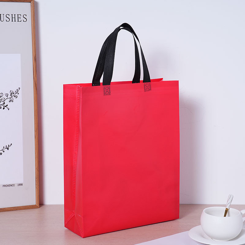 Tienda de ropa gran bolsas de tela no tejida recubiertas logotipo bolsas de compras coloridas regalos bolsas de tela no tejida sensación alta