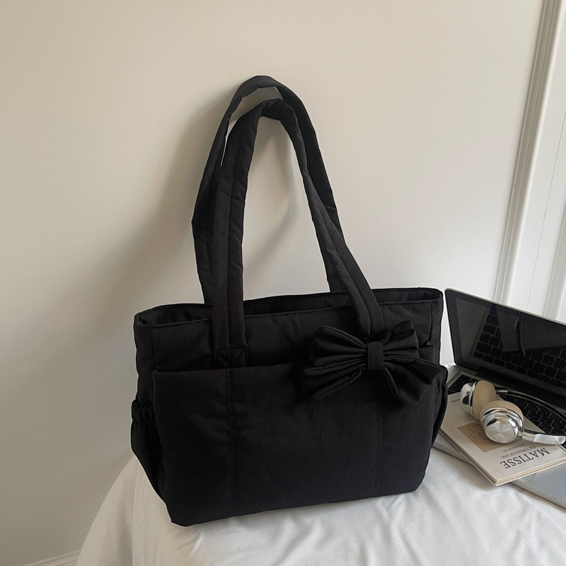 Bolso de lazo retro simple y ligero de color sólido bolso especial de costura de coche de moda femenino bolso de ropa de algodón de textura de hombro único bolso de moda