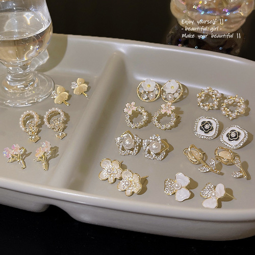S925 Silver Needle Fashion Small Fresh Pearl Flower Earrings Women's Niche Design High-end Exquisite Cat's Eye Stone Earrings