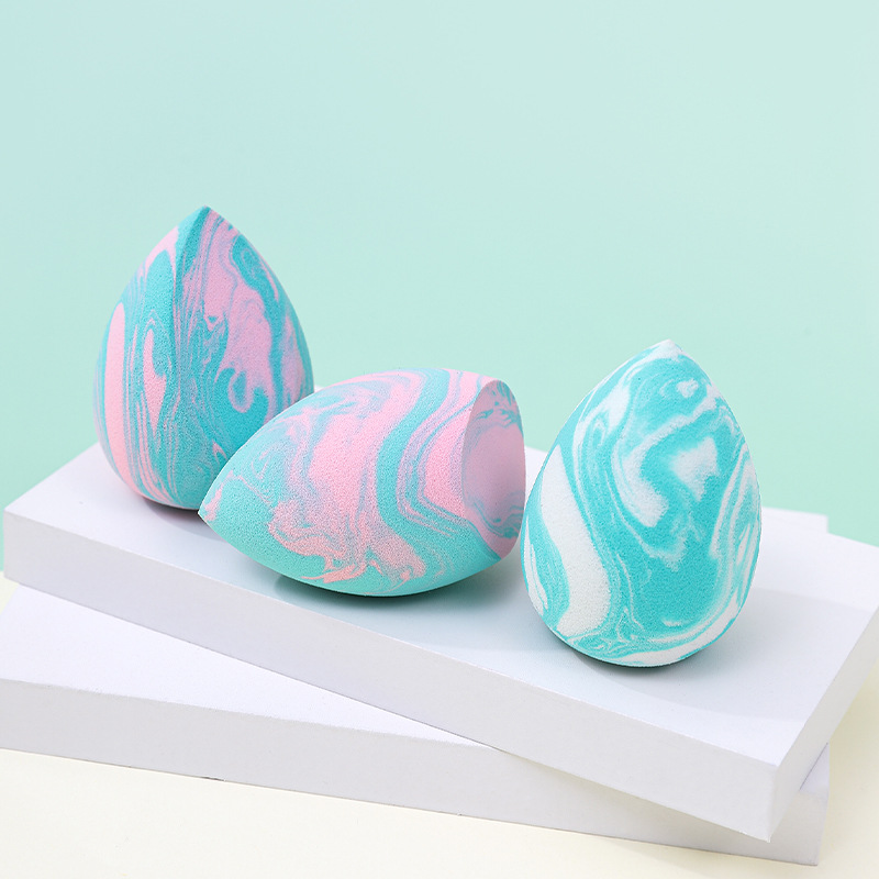 Colores mezclados transfronterizos en forma de gota de maquillaje de belleza en forma de huevo La borla de polvo se agranda con el agua, la fábrica de huevos de esponja de maquillaje sin látex se personaliza al por mayor