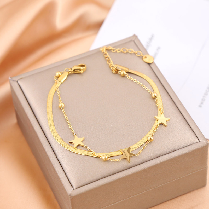 Diseño de nicho transfronterizo sensación de cadena de estrellas doble capa de acero de titanio chapado en oro moda universal no desvanecer pulseras al por mayor