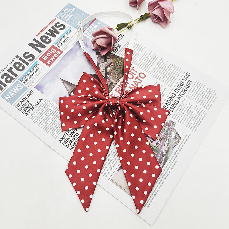 Punto al por mayor de doble capa oblicua pajarita de lunares moda nueva camisa estilo universitario uniforme enorme mango largo cuello JK flor