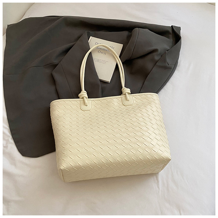 Bolso de patrón tejido de gran capacidad Bolso de hombro de cercanías de moda transfronteriza para mujer Bolso de tote de todo fósforo casual de alta gama