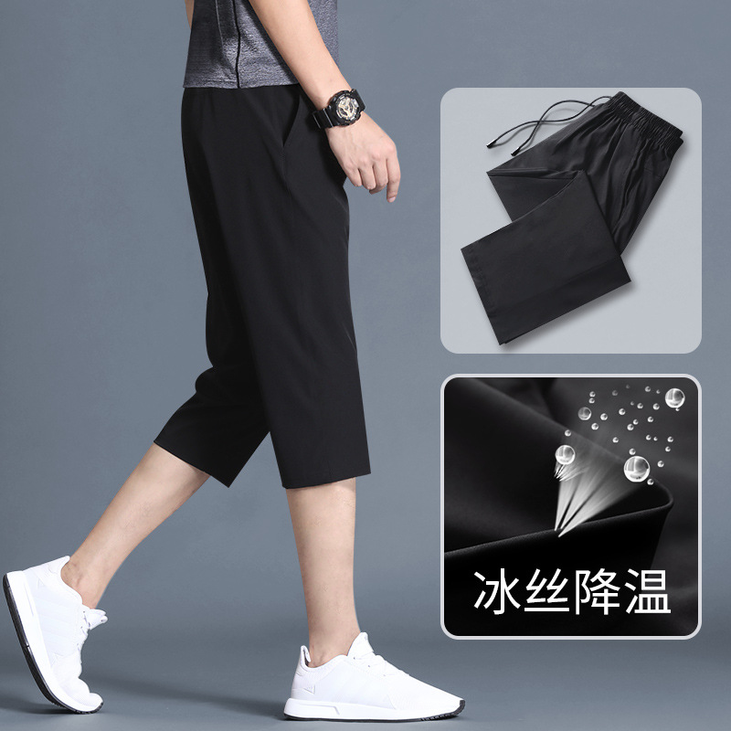 Pantalones cortos deportivos masculinos sueltos casuales 7 puntos pantalones secos rápidos 8 puntos de verano delgados 7 puntos pantalones de corrida de moda