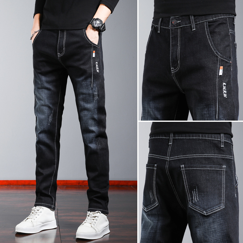 2026 nuevos jeans de hombre otoño y invierno delgados pies negros gruesos pantalones de tendencia de primavera y otoño