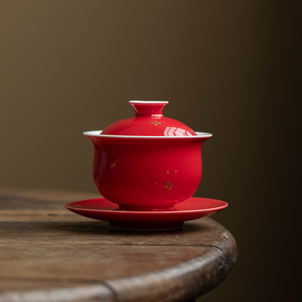 Red festive ceramic tea cup for home use