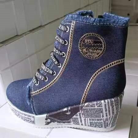 2023 nuevas botas de moda con cordones de punta redonda de lana Comercio exterior de moda más tamaño de cuña inferior inglés zapatos altos