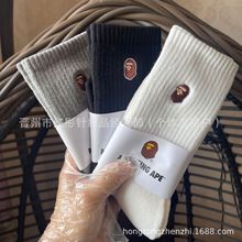 日单潮牌猿人头刺绣黑白灰袜子男女情侣毛巾底运动中高筒跑步袜子