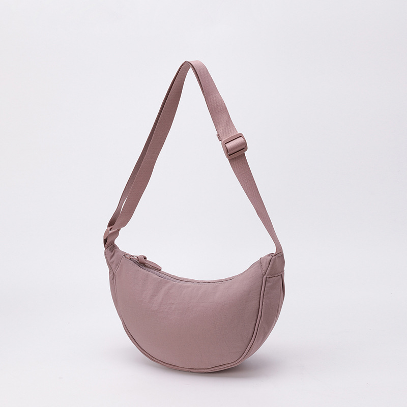 Bolso de tela pequeño bolso de moda ligero bolso de mochila de nylon transfronterizo mujer bolso de hombro casual versátil bolso de bolsas de bolsas de bollo de gran capacidad