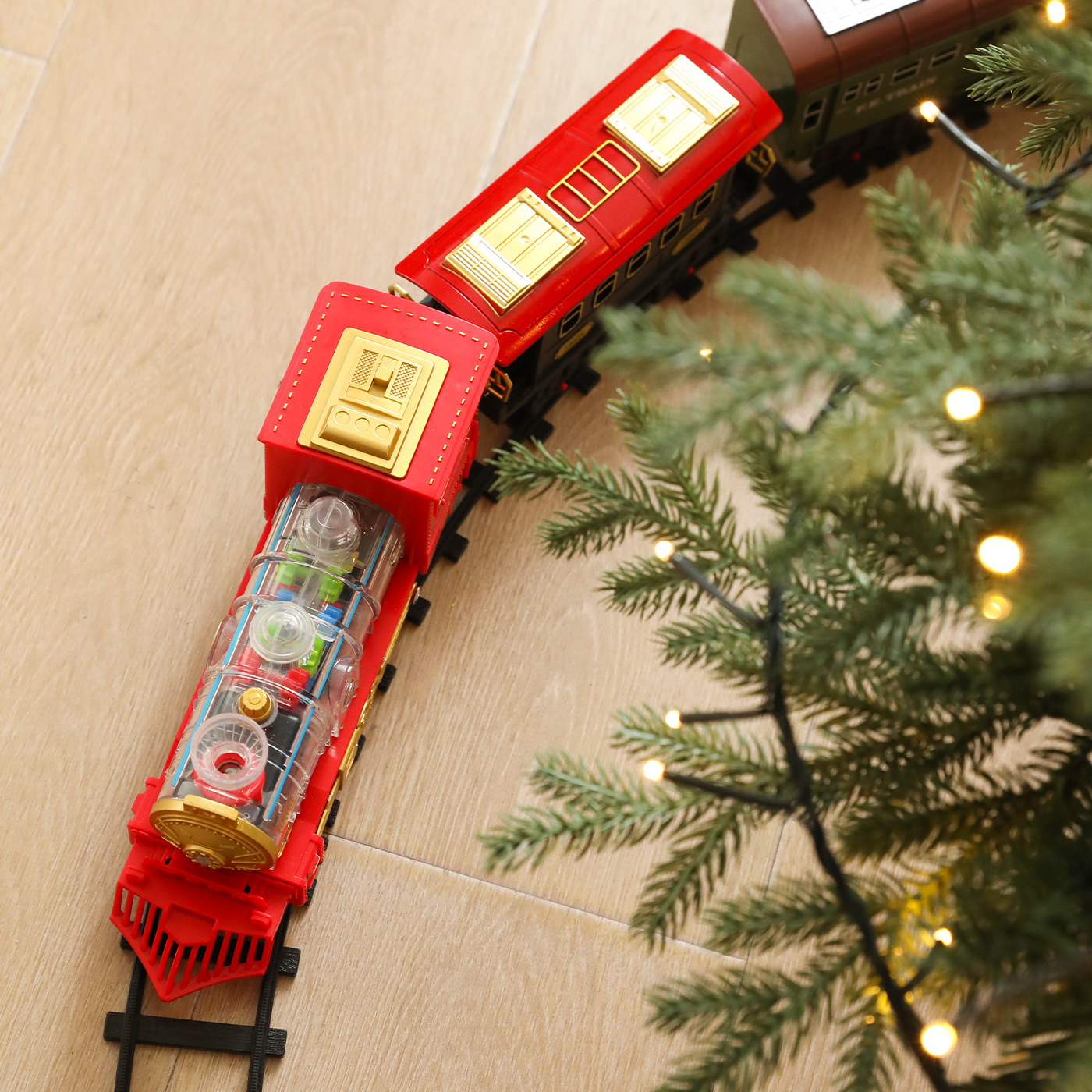 Transfronterizos niños regalos divertidos ferrocarril eléctrico trenes de Navidad decoración de Navidad ferrocarril carruaje decoración de árbol de Navidad