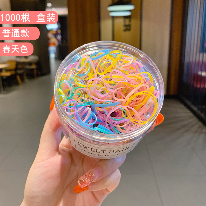 Banda de goma desechable de color cubierta de cuero cabeza de lazo elástico alta banda de goma pequeña hembra negro adulto niños pelo cuerda banda de pelo al por mayor