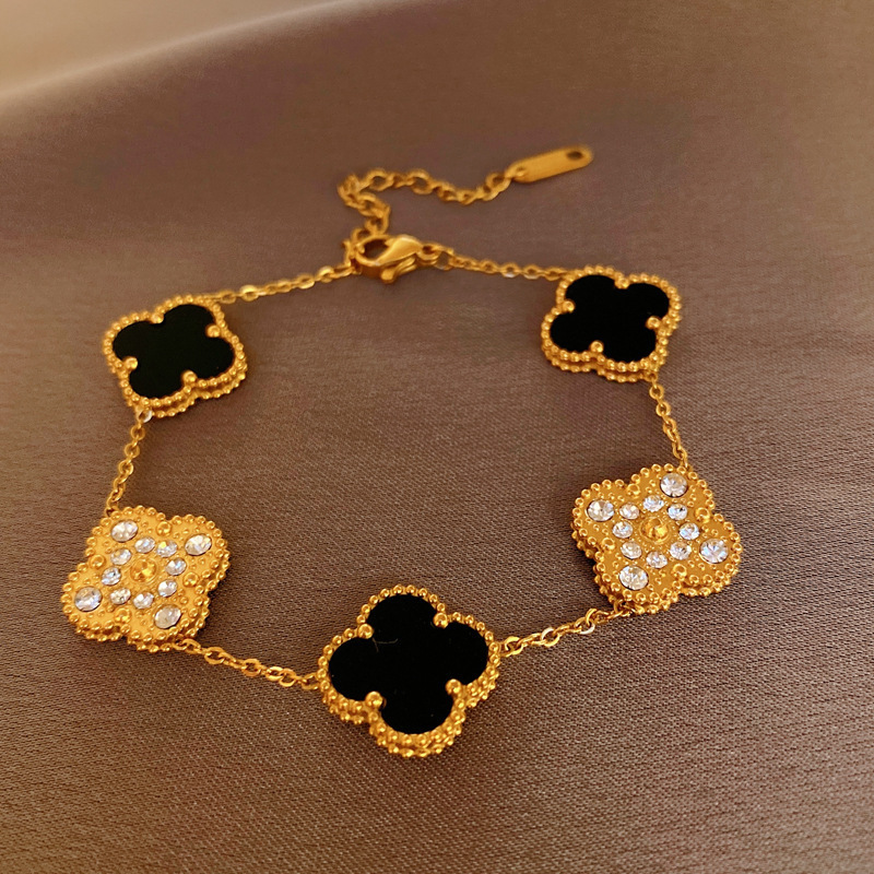 本物の金メッキジルコンの貝母の花のブレスレットはシンプルで、手の輪の軽い高級感のある手飾りの女性の卸売りです。|undefined
