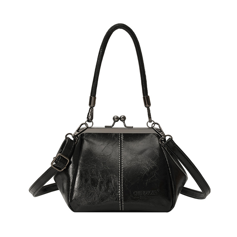 Bolso de conchas de moda para mujeres 2026 comercio exterior nuevo bolso coreano de abrazadera alta sensación retro versátil mochila