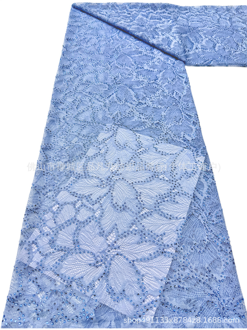 Nuevo hueco flor de encaje fondo tela de perforación caliente pesada cola de pez vestido de boda vestido de noche brindis tela spot