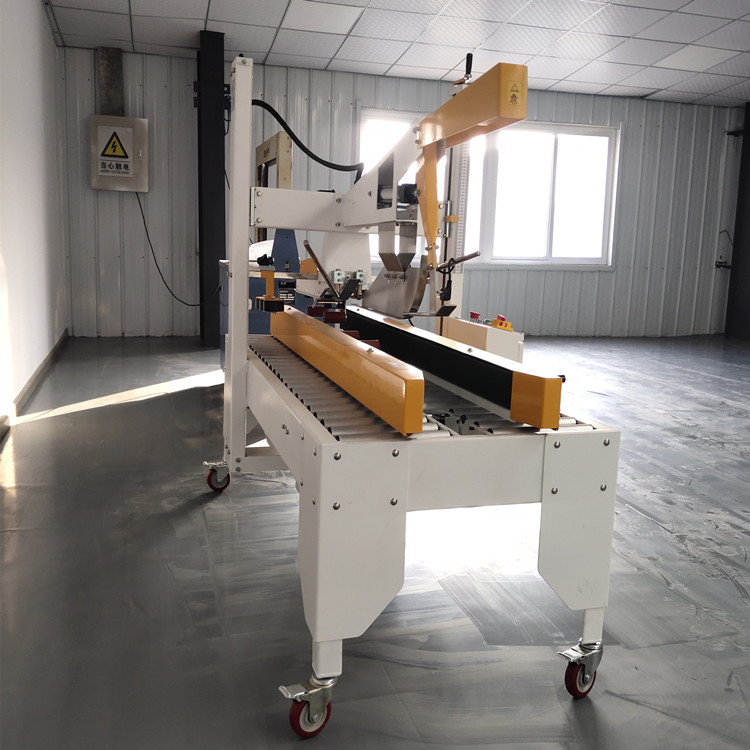 厂家批发JPC500半自动折盖封箱机   自动折盖封箱机厂家