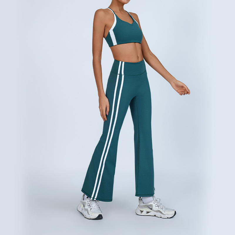 Comercio exterior transfronterizo europeo y americano nuevo traje de yoga belleza femenina chaleco cruzado de color de contraste cintura alta pantalones acampanados blancos de secado rápido