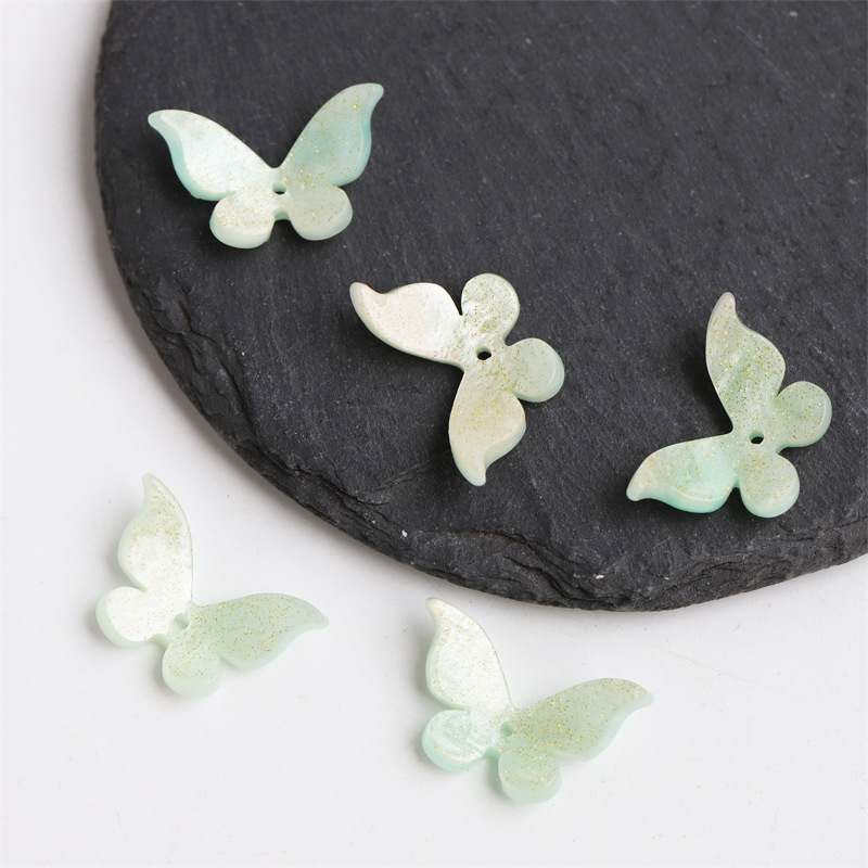 Accesorios para bisutería: mariposas de acetato, agujas para el pelo – Mayorista de Yiwu