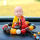Wooden fish solar monk car decoration car shaking head small Sha mi center console car interior car decoration