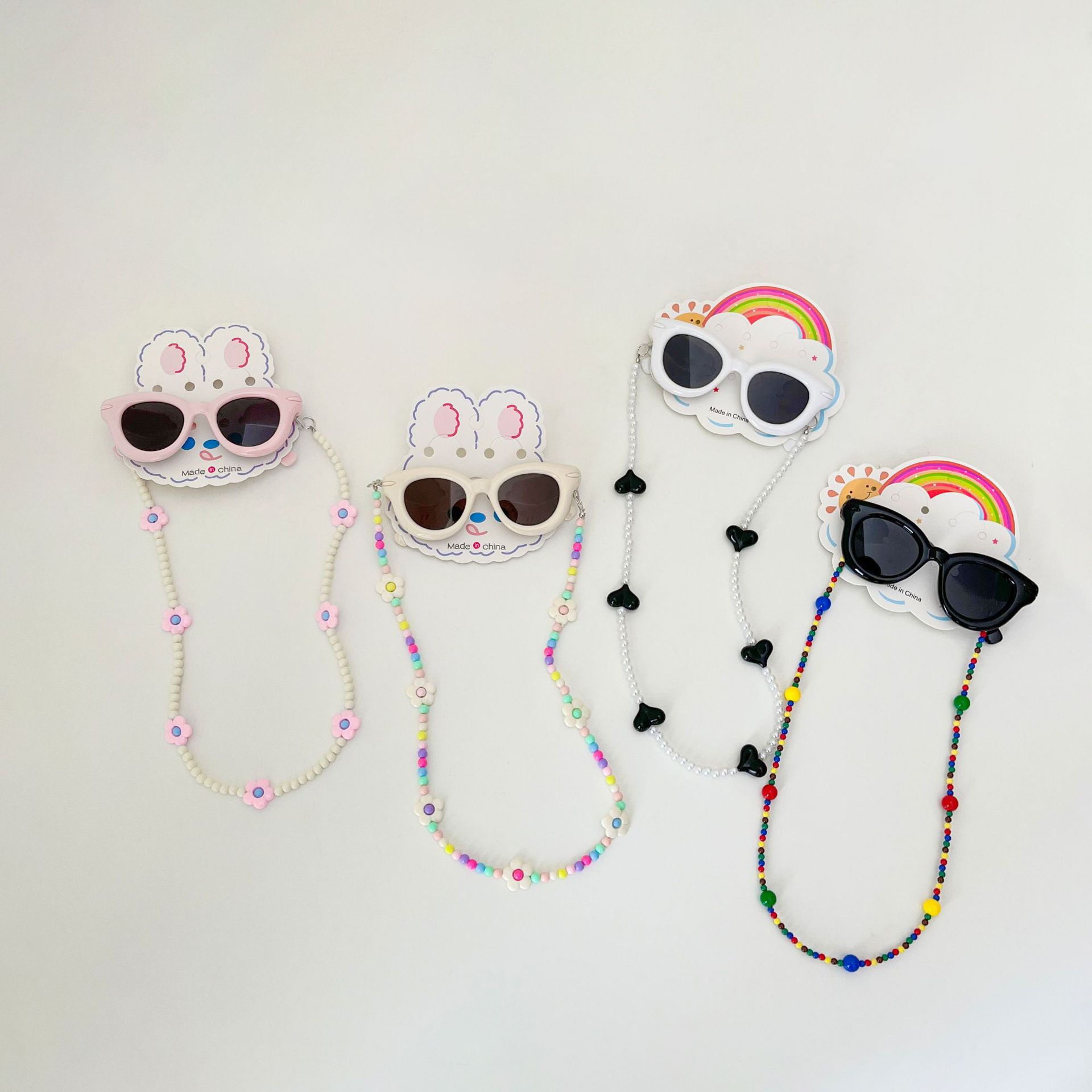 ins verano dopamina niños gafas de sol con cadena conjunto de gafas de sol anti-UV bebé colgar cuello