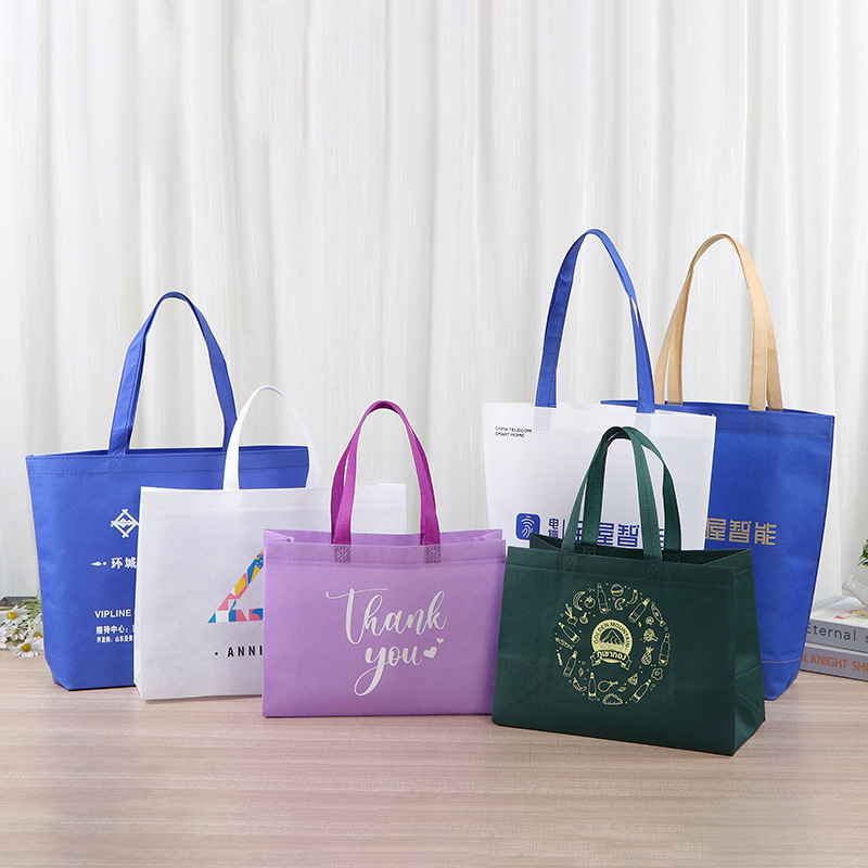 Bolsa de tela no tejida de costura de automóvil de gran capacidad reforzada bolsas de compras de necesidades diarias con fondo de película lateral bolsas de mano impresas en color de doble cara