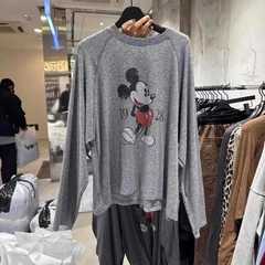 韓国東大門VAN * ta 25春の新型アニメミッキープリントのゆるい丸首が肩の長袖tシャツの女性を挿します。