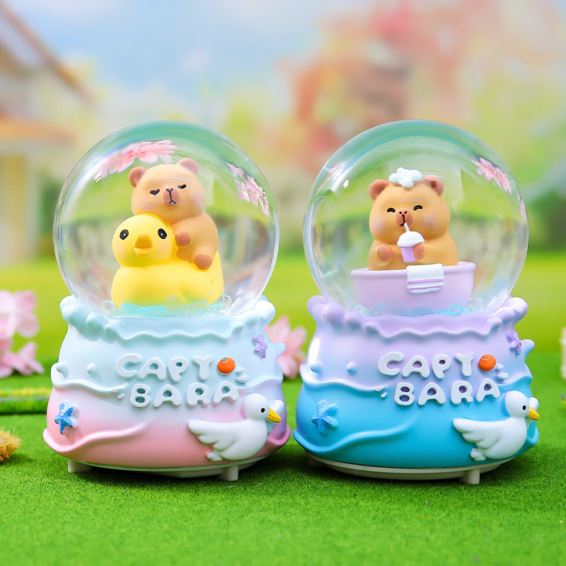 Red roja caliente Kapibala bola de cristal caja de música nieve que brilla estudiantes niños regalos navideños decoración de la habitación