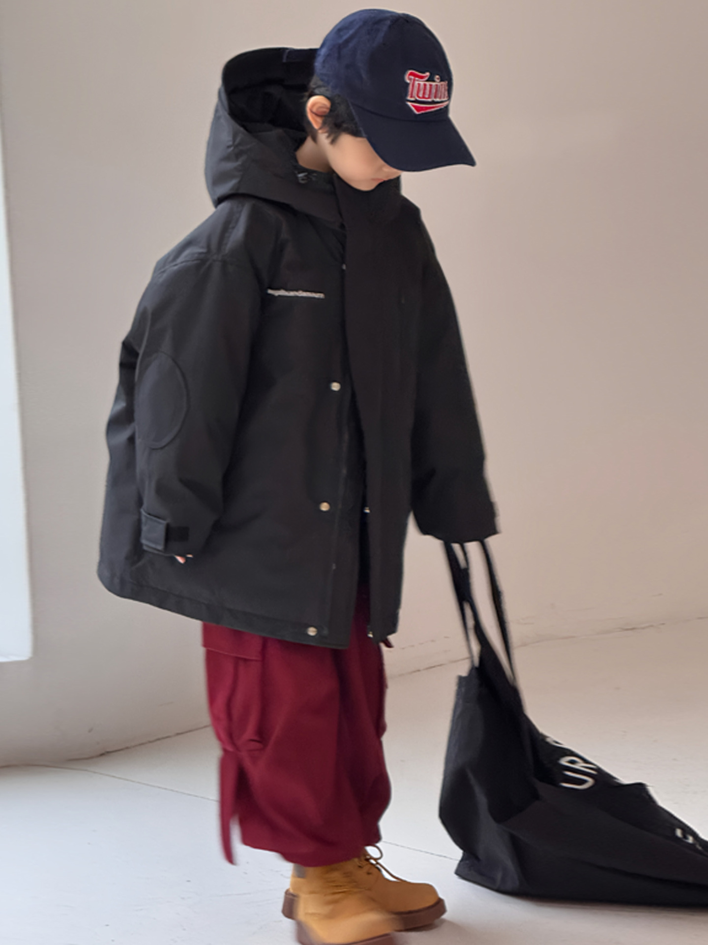 Trajes infantiles de plumón 2025 nuevo estilo coreano para niños y niñas niños mayores gruesos chaqueta impermeable de goma blanca