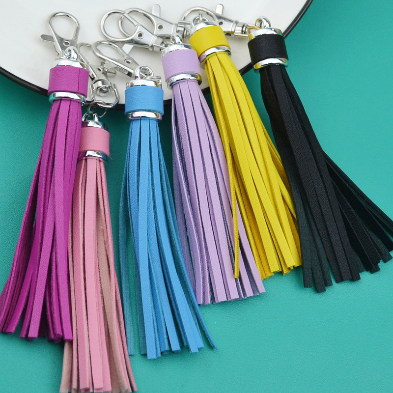 Silver leather tassel pendant covered long tassel silicone bead bracelet accessories artificial environmental protection Leather Tassel Keychain Silver leather tassel pendant covered long tassel silicone bead bracelet accessories artificial environmental protection Leather Tassel Keychain