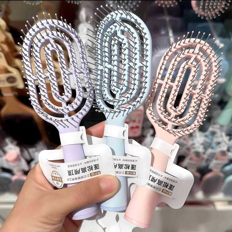 New Hollow-Out Design High-Quality Mini Portable Ribbed Comb with Air Cushion for Fluffy Hair and Massage New Hollow-Out Design High-Quality Mini Portable Ribbed Comb with Air Cushion for Fluffy Hair and Massage
