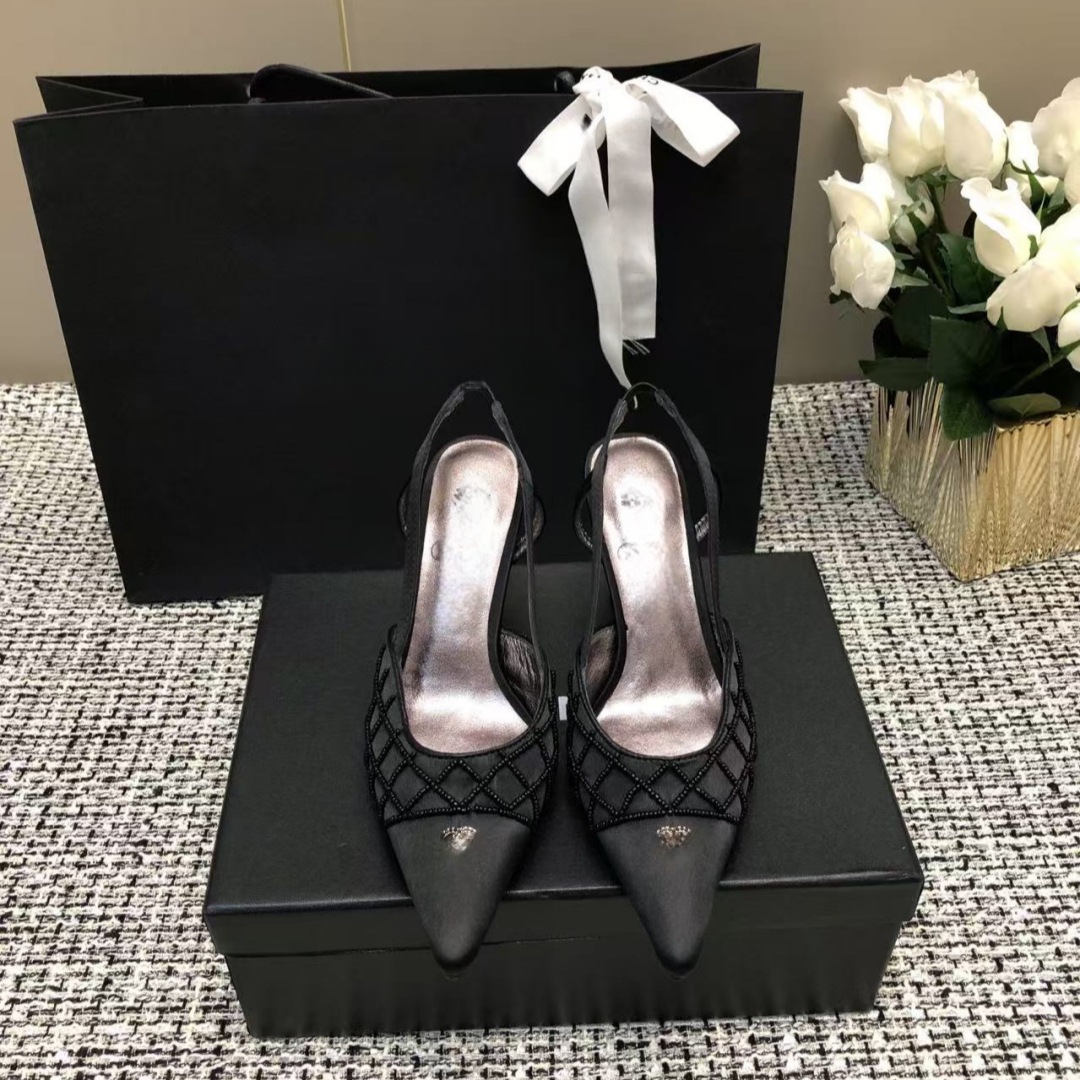 Elegant fashionable high heels with diamond pattern pointed-toe made…