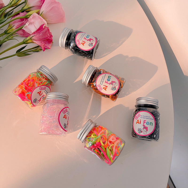 Cuerdas de cabello portátiles mini enlatadas tiras de goma desechables no lastiman el cabello de niñas para el cabello de bebé para el cabello de base