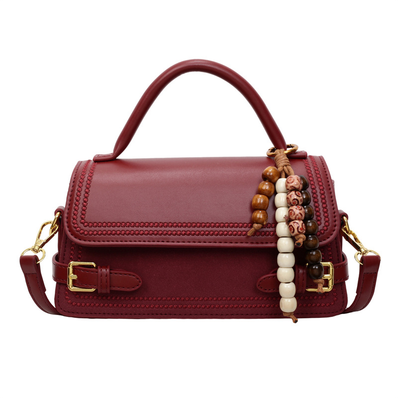 Bolso de mano popular de mujer de alto nivel de moda versátil bolso de hombro pequeño otoño y invierno 2025 nuevo tipo de mochila de viaje