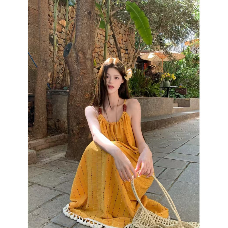 慵懒松弛感黄色流苏吊带显白连衣裙海边度假气质长裙绝美沙滩裙夏|undefined