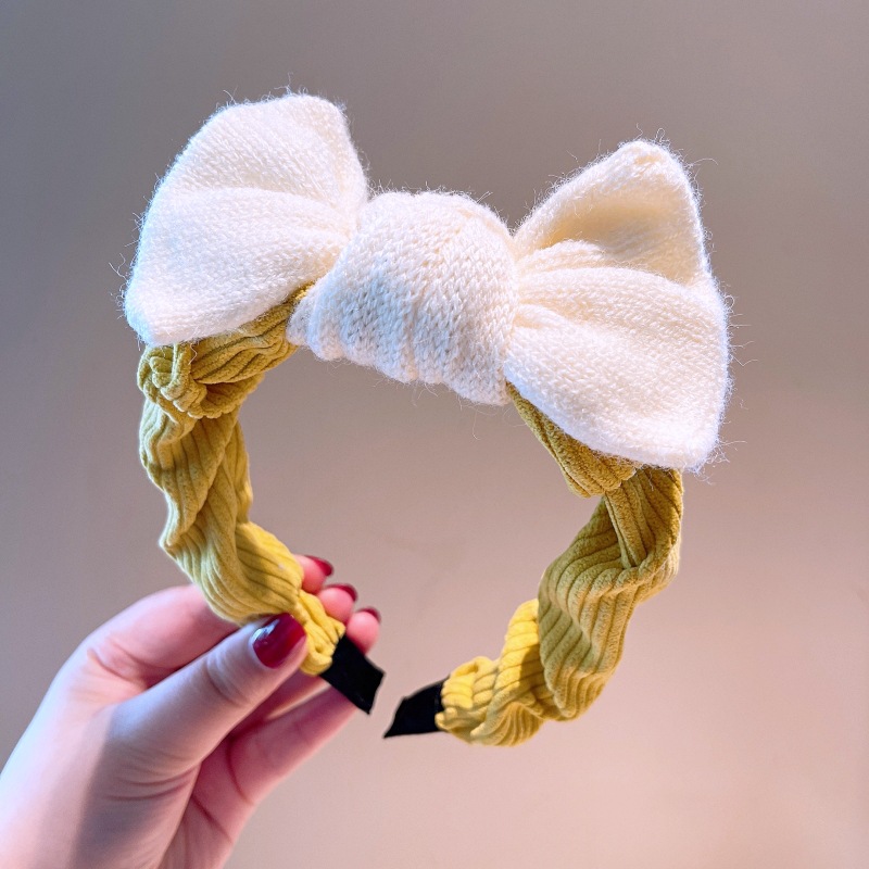 South Korea's Dongdaemun Autumn And Winter New Knitted Bowknot Contrasting Color Headband Western Simple Temperament Pressure Hair Sweet Headband display picture 6