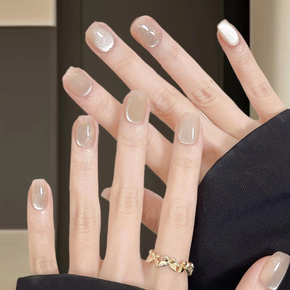 Un pequeño libro rojo transparente ojo de gato para usar uñas puras para blanquear las uñas 24 piezas de uñas falsas productos terminados venta directa al por mayor