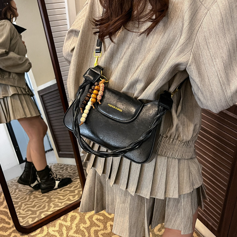 Bolsas de mujer transfronterizas retro de cuero suave de hombro brazo bolsas de invierno 2025 nuevo estilo de alta calidad de la mochila de viaje al trabajo