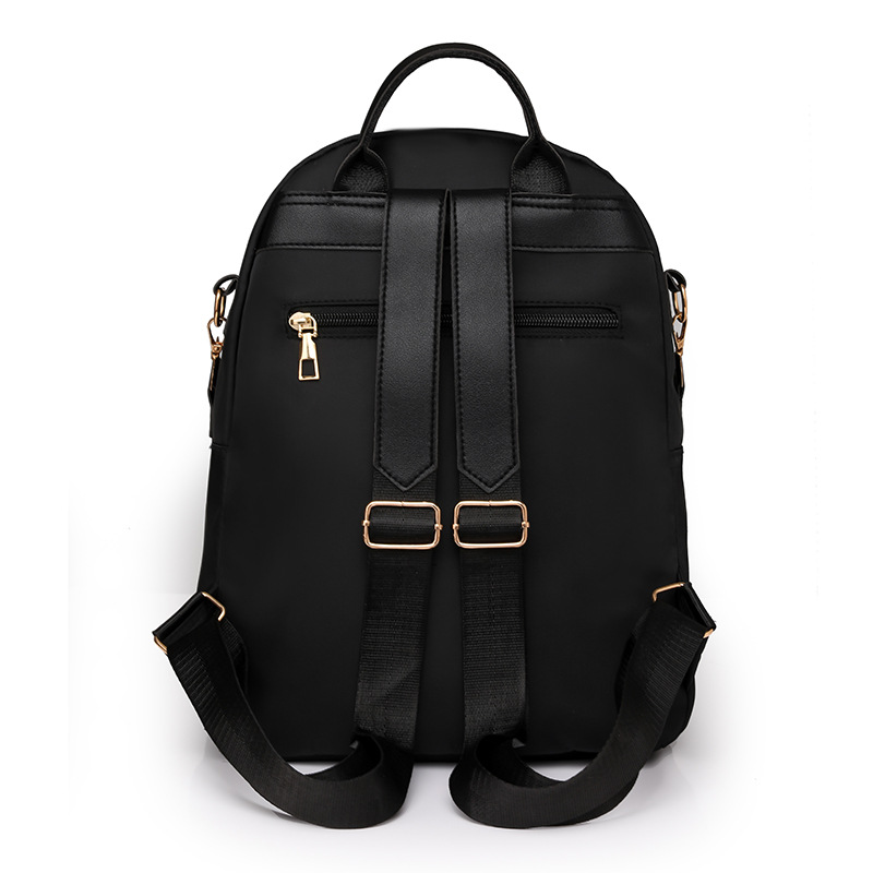 Bolsos para mujer 2023 nueva mochila de nylon para mujer coreana moda salvaje color de contraste mochila de viaje al aire libre al por mayor