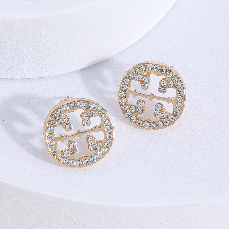 European and American fashion light luxury simple commuter niche design inlaid rhinestone hollow small metal round earrings wholesale European and American fashion light luxury simple commuter niche design inlaid rhinestone hollow small metal round earrings wholesale