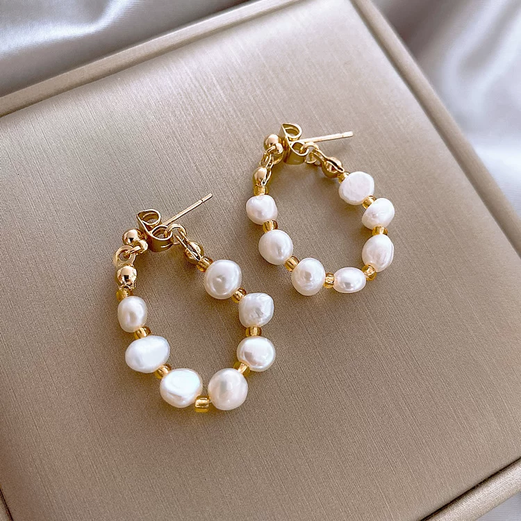 Organic demi-season earrings from pearl, silver 925 sample