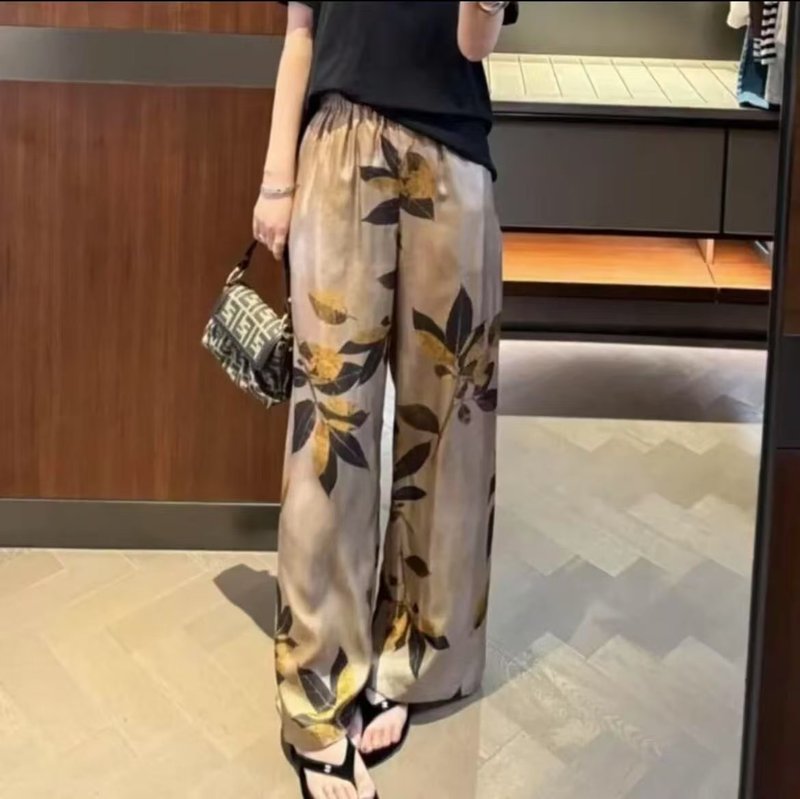 綿のシルクの寝ズボンの女性の夏の薄いタイプの綿のシルクの9分の広い足のズボンのプリントの家は外で人工の綿のズボンを着ることができます。|undefined