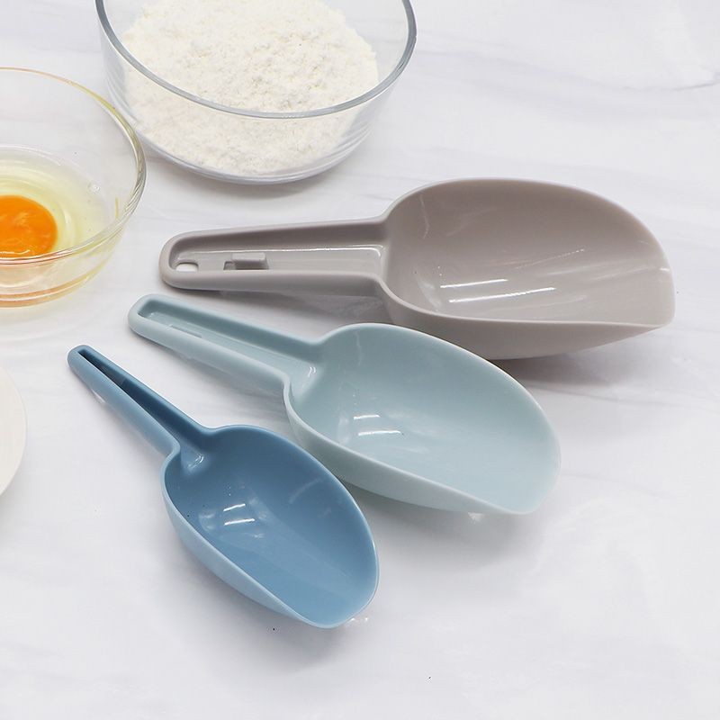 Palas de alimentos engrosadas palas de hielo de plástico palas de harina de colores domésticas palas de alimentos palas de comida transfronterizas cucharas de comida para gatos y palas de comida para perros