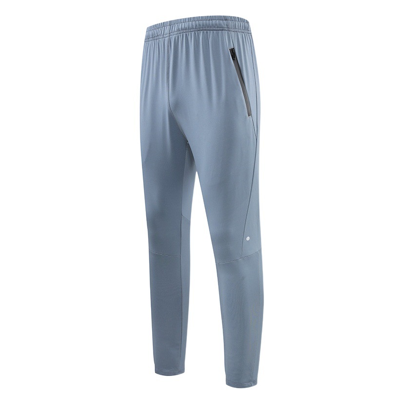 Nuevos Pantalones deportivos casuales de los hombres sueltos rectos altos elásticos al aire libre corriendo baloncesto pantalones de fitness pantalones de secado rápido uniforme escolar